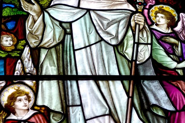One of the stain glass windows in St Columba’s Church, Long Tower, depicting Saint Columba, the patron saint of Derry.  DER2320GS - 002