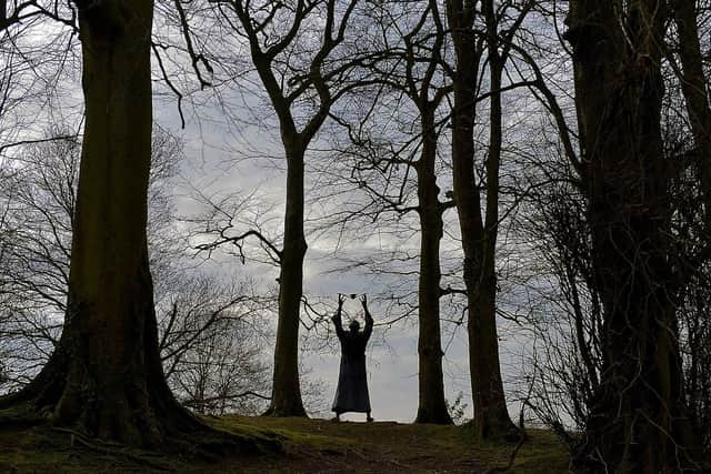A silhouette view of Niall Bruton's sculpture of Saint Columba in St Columba's Park. The art work of the Derry saint, also known as Colmcille, stretches nine feet to the tip of the outstretched fingers, was unveiled in March 2013.  Photo: George Sweeney / Derry Journal.  DER2109GS – 011