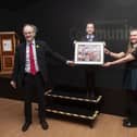Education Minister Peter Weir is presented with a special memento by Molly McGee and Holly Bonner during Wednesdayâ€TMs  official opening of the newly refurbished Studio 2 Youth and Community Arts Centre. (Photos: Jim McCafferty Photography)