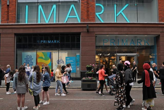 People queue outside Primark in Belfast earlier this year