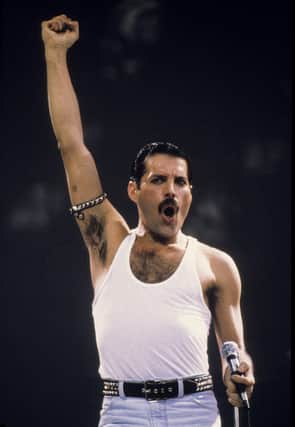 Programme Name: A Life in Ten Pictures - TX: n/a - Episode: In Ten Pictures - Freddie Mercury (No. n/a) - Picture Shows: -Live Aid, London â€“ 1985
 Freddie Mercury - (C) Anwar Hussein - Photographer: Anwar Hussein