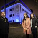 OVARIAN CANCER AWARENESS.. . . . . .The Mayor of Derry City and Strabane District Council, Brian Tierney pictured with Ovarian Cancer campaigner Natalie Cairns and her sister Angela at the Council Offices, Strand Road recently as they were lit up to raise awareness of Ovarian Cancer.