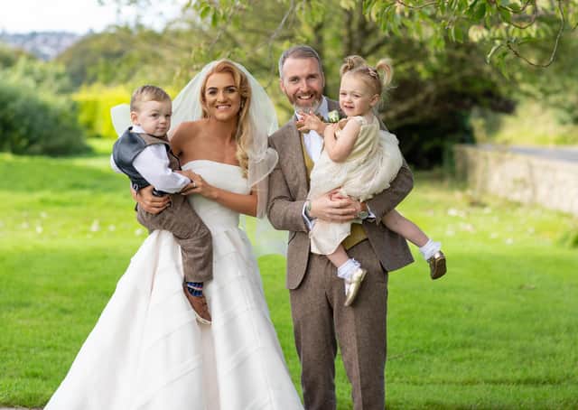 Bronagh and Thomas Burke, pictured on their wedding day with their children.