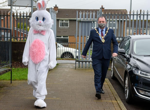 Derry City and Strabane District Council Mayor, Councillor Brian Tierney with the Easter bunny pictured during visits to local schoolchildren this week. Picture Martin McKeown. 29.03.21