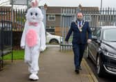 Derry City and Strabane District Council Mayor, Councillor Brian Tierney with the Easter bunny pictured during visits to local schoolchildren this week. Picture Martin McKeown. 29.03.21
