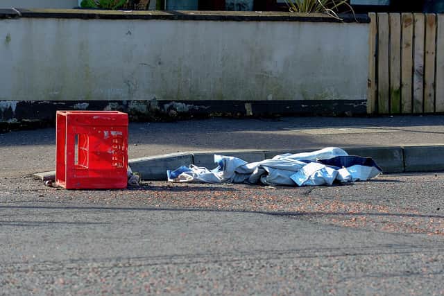 Items of clothing and a crate discarded at the Dungiven Road entrance to Irish Street where violence erupted on  Friday and Sunday evening last. DER2114GS – 003