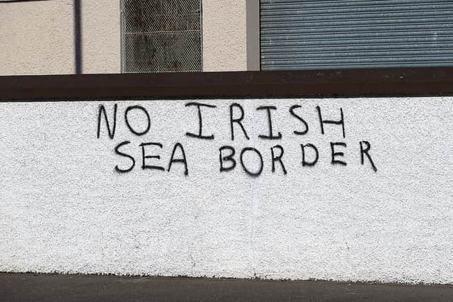 ‘No Irish Sea Border’ graffiti on a wall on Rossdowney Road in the Waterside. DER2114GS – 005
