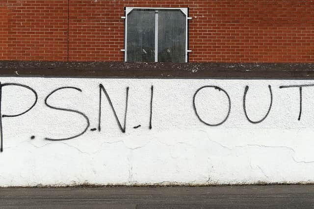 Loyalist ‘PSNI Out ‘graffiti on a wall in Rossdowney Road in the Waterside. DER2114GS – 007