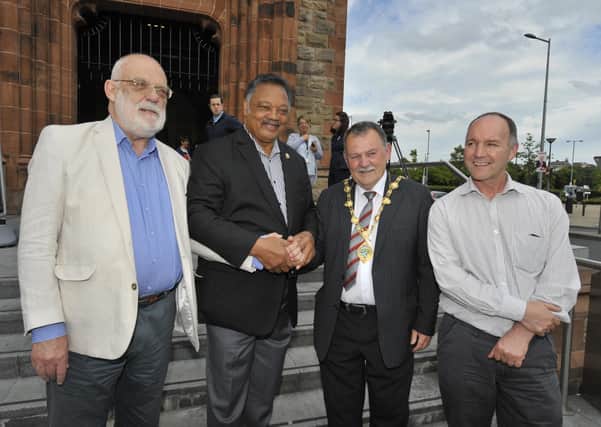 The chairman of the Bloody Sunday Trust, Tony Doherty pictured back in 2017 with the Reverend Jesse Jackson, Robin Percival, Bloody Sunday Trust, and the then Mayor Colr Maolíosa McHugh. DER2417GS020