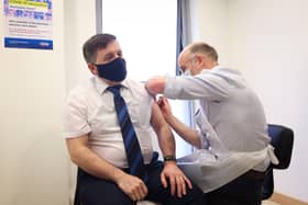 Press Eye - Belfast - Northern Ireland - 31st March 2021

Swann receives Covid-19 vaccine and urges public do same 

Health Minister Robin Swann received his first Astra Zeneca vaccine today at a community pharmacy in Ballymena.

He is pictured at the Ballee Pharmacy with pharmacist Stephen Burns. 

Photo by Kelvin Boyes / Press Eye.