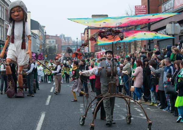 A previous St. Patrick's Day Spring Carnival makes it's way through Derry city centre.