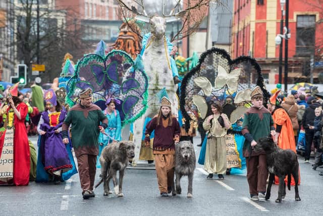 Three Irish Wolfhounds lead a previous Derry City and Strabane District Council's  annual Spring Carnival on St. Patrick's Day in Derry.