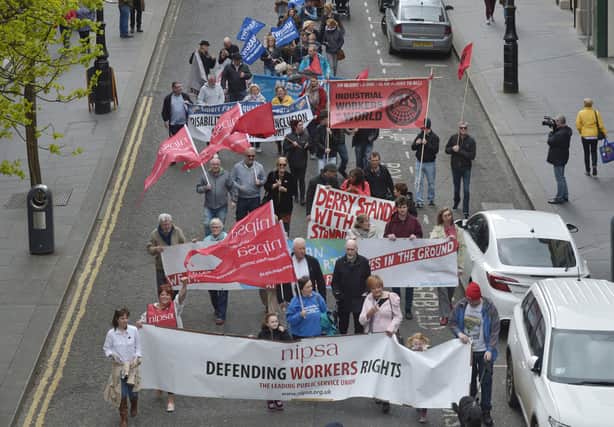 The Derry Trades Union Council march makes it way down Shipquay Street on Saturday afternoon last. DER1717GS021