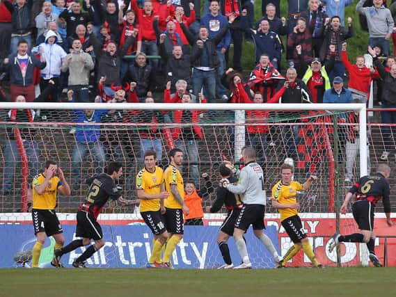 Crusaders' Colin Coates scores the Irish League club's second goal in the 2012 Setanta Cup Final against Derry City at the Oval.