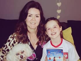 Author Joanne Henry with her daughter Hannah and her new book, Memoirs of a Mad Mammy.