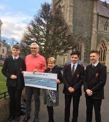 Eileen Best, Director of Operations First Housing, and Gerry Burns, Manager of Damien House, pictured along with Jackson Gallagher, Jack Gallagher and Owen McGeehan from St. Joseph’s Boys’ School following a sleep out event in 2019.
