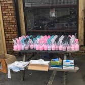 The giveaway set up outside A&E Car Wash and Valeting Services.