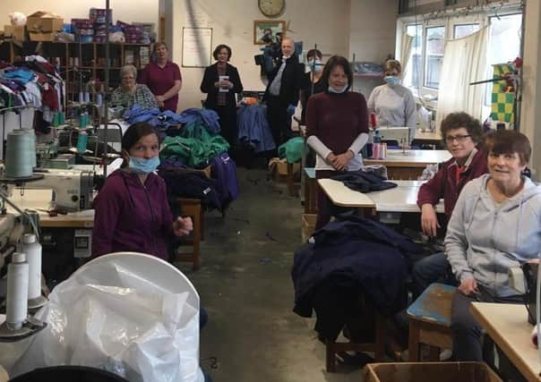 Some of the workers pictured at Moville Clothing.