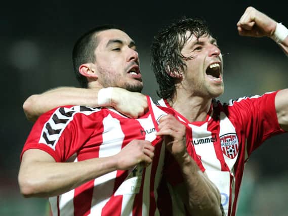 Vinny Sweeney celebrates with Emmett Friars who scored the equalising goal against Cork in Derry City's opening First Division match at Brandywell in 2010.