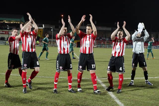 Derry City players applaud the large home support against Cork City FORAS in March 2010.