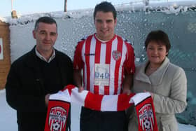 Stephen McLaughlin pictured with his parents, Neal and Carmel the day he signed for Derry City in 2010.