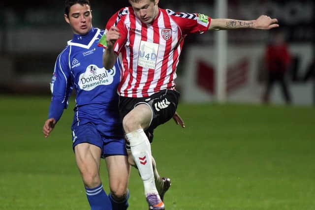 Finn Harps' Stephen McLaughlin up against Derry City's James McClean.