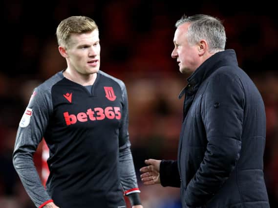 James McClean talks to Stoke City manager Michael O'Neill.