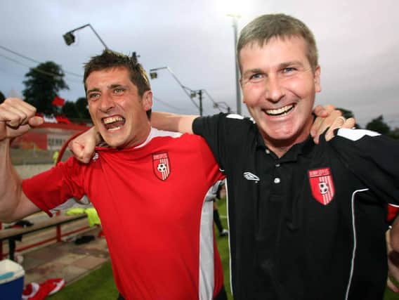 Declan Devine celebrates victory over Gothenburg in the Uefa Cup first round with Stephen Kenny.