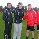 Derry City manager Stephen Kenny wishes Sunderland-bound James McClean all the best after his final training session with the Candy Stripes in 2011. Also pictured Declan Devine (left), coach and Colm ONeill, physio.