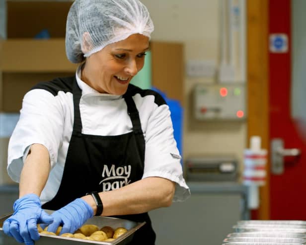 Moy Park chef Julia Winters is pictured helping prepare 1,000 meals for donation to The Resource Centre Derry.
