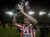 Peter Hutton holding aloft the FAI Cup after Derry City's memorable win over St Patrick's Athletic.