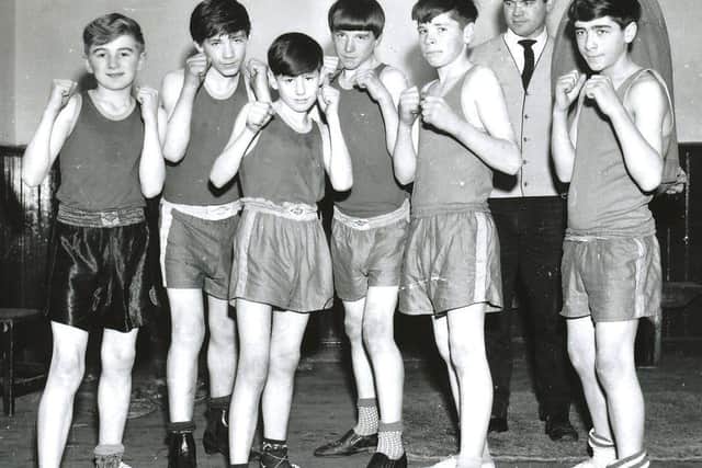 Charlie Nash (second from left) and his brother Willie (third from right) pictured in November 1966 with coach, Tommy Donnelly and other boxers from St Marys Club who figured prominently in the NW Area finals of the Association of Boys Clubs Championships in Derry.