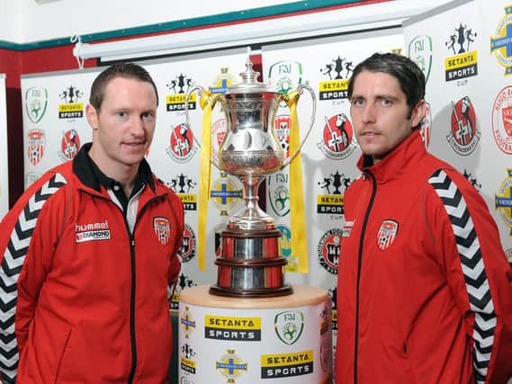 Barry Molloy and Ruaidhri Higgins pictured representing Derry City with the Setanta Cup in 2012.