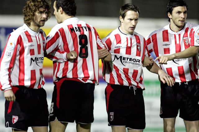 Molloy lines up the City wall, alongside Paddy McCourt who he names as the best player he's ever played with during his time at the Candy Stripes.