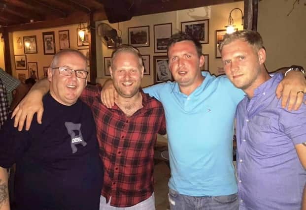 Patrick McManus (on left) with his sons, Kevin, Stephen and Adrian.