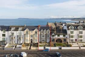 This nine bedroom mid-terrace property in Portrush (outlined here in red)  enjoys wonderful views across Ramore Head and the Atlantic Ocean.