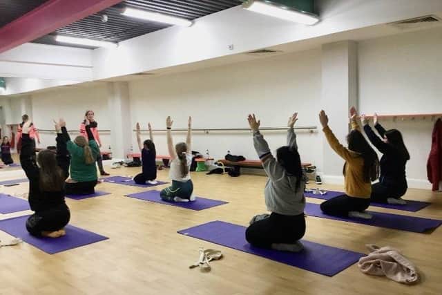 Some of the teenageres who attend the yoga classes led by Amanda in Studio 2.