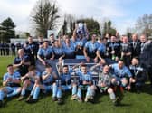 Eamonn Seydak and his Institute team-mates celebrate their memorable Bluefin Sport Championship victory in 2018.