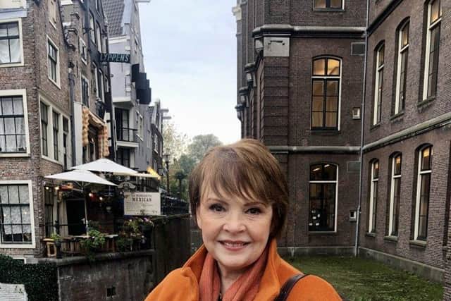 Dana revisits Amsterdam during filming for Dana – The Original Derry Girl