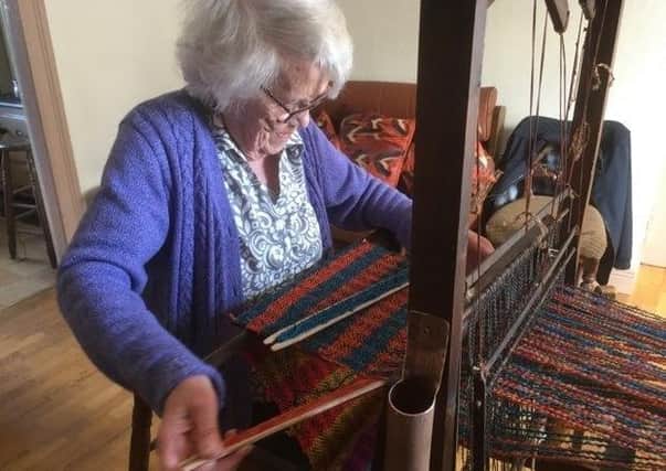 Kathleen Shiels with her loom.