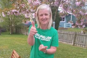 Macmillan Move More Programme participant Sandra Gallagher celebrates after completing a virtual climb of the steps of the Christ the Redeemer statue in Rio de Janeiro.