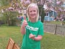 Macmillan Move More Programme participant Sandra Gallagher celebrates after completing a virtual climb of the steps of the Christ the Redeemer statue in Rio de Janeiro.