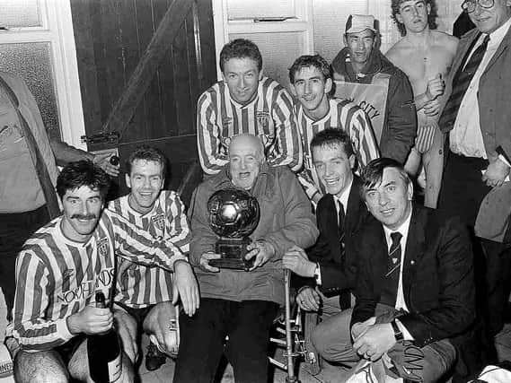 Felix Healy, left, pictured celebrating the 1988/89 Premier Division championship with his Derry City teammates, backroom staff and fans.
