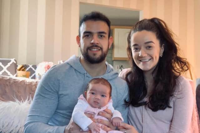 Derry City's Darren Cole, pictured with girlfriend Orlaith Meenan and their baby daughter Cra.