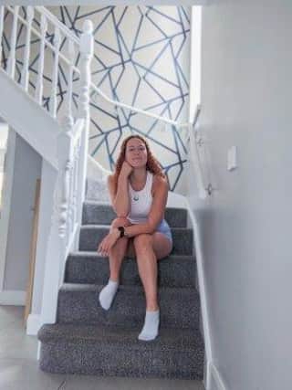 Chloe Tinney who is climbing the equivalent of Mount Everest in her own home to raise funds for Foyle Search and Rescue.