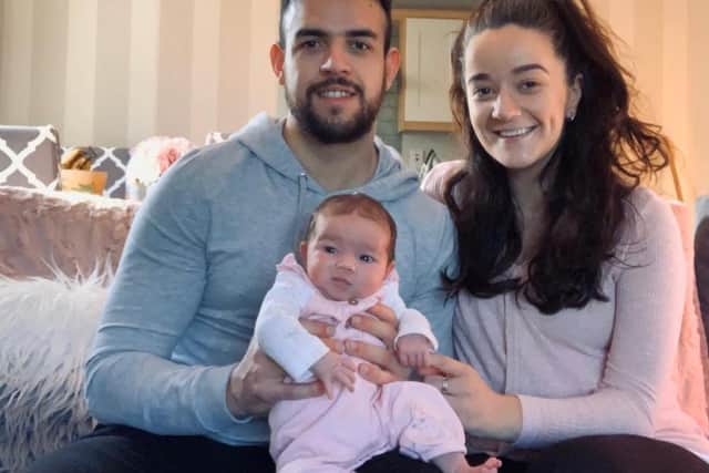 Derry Citys Darren Cole, pictured with his partner, Orlaith Meenan, and their baby daughter, Cria.