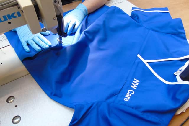 The scrubs being made by Hunter Apparel Clothing