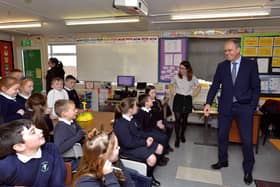 2018: Joe McHugh T.D. Minister for Education and Skills speaking with pupils during a visit to Bunscoil Cholmcille Naíscoil Dhoire’s 35th anniversary celebrations back in 2018.  DER4218GS