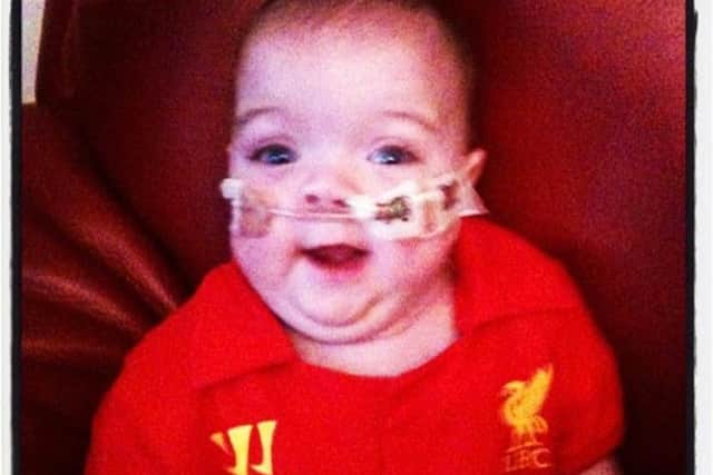 Little Grace O'Reilly, a Liverpool fanatic, was born 24 weeks premature, weighing 610 grams.