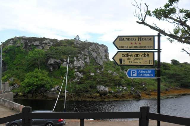 Signage at An Bun Beag harbour in the Gaeltacht.